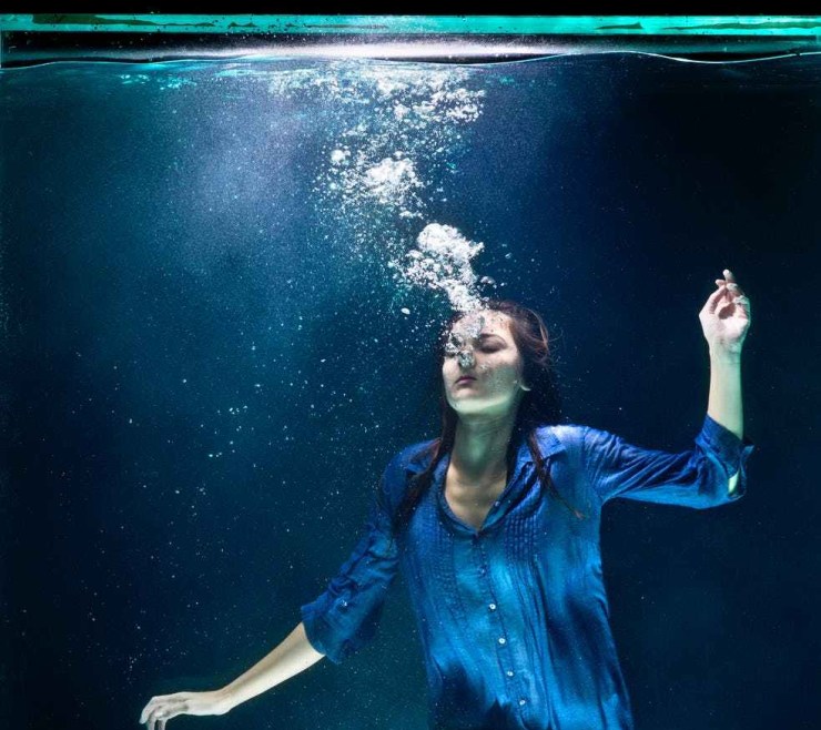 underwater photography of woman